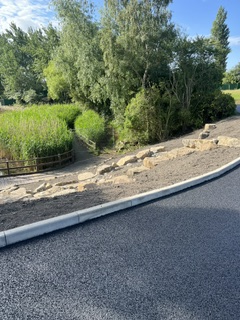 Man-Made Waterfall, Curbs & Roadwork — Kerb & Verge